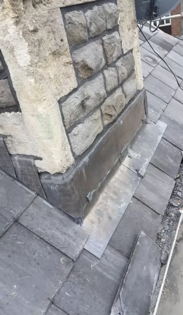 General brick roof chimney repair Bristol on a pitched tile roof